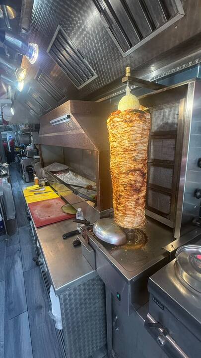 Chicken doner turning on the spit at Redwood Fish & Chips
