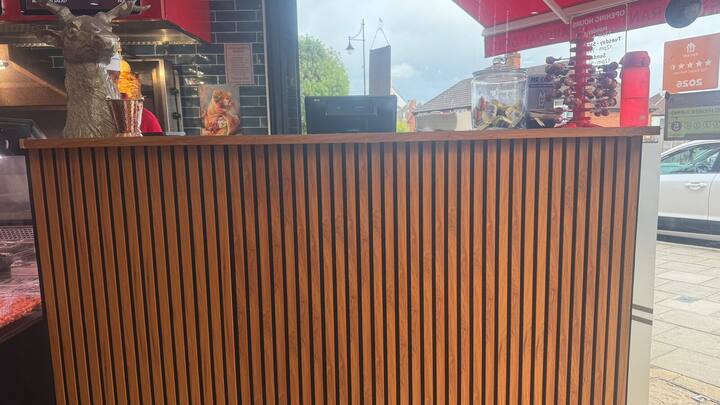Slatted oak front counter